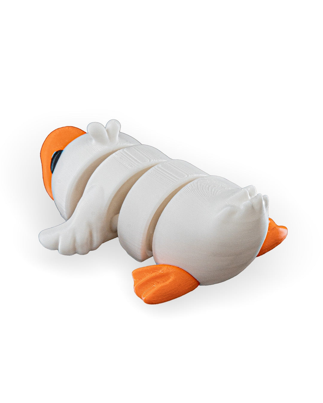 A white segmented caterpillar-shaped dog toy with bright orange feet, antennae, and a black eye detail, shown on a clean white background.