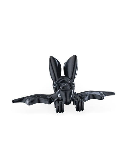Front view of the bat fidget toy with wings fully spread in a hanging pose