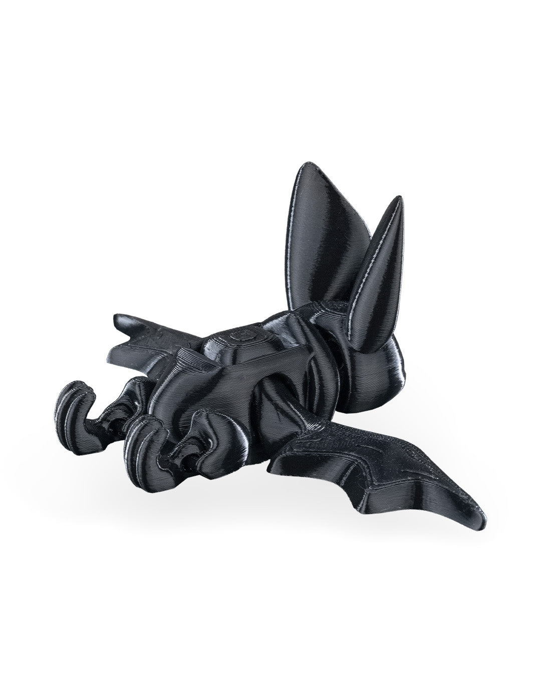 Articulated bat fidget toy shown from above with wings partly spread