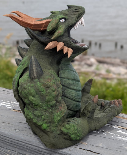 Side view of the devourer dice tower with head tilted back and horns visible