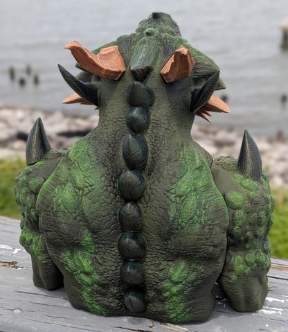 Back view of the devourer dice tower showing its spiked spine