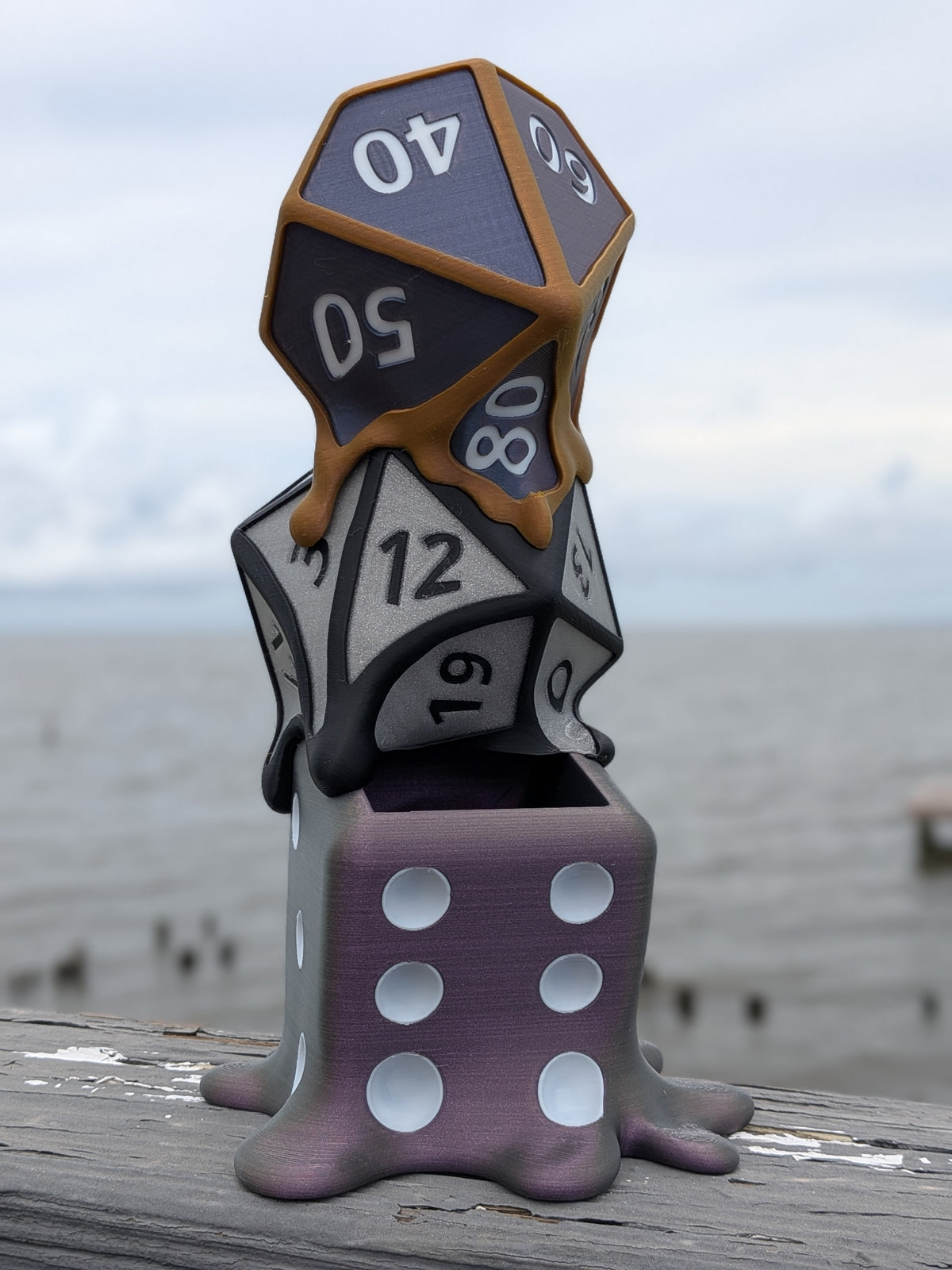 Melting dice planter, angled view of the drip tray and dice stack