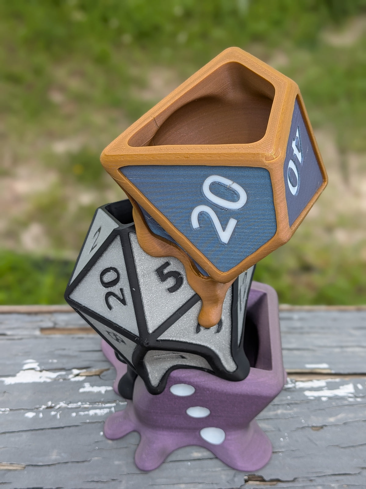 Melting dice planter, close-up of the D20 die faces