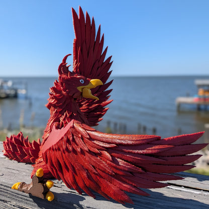 Articulated phoenix figure, close-up of the feather detail and wings