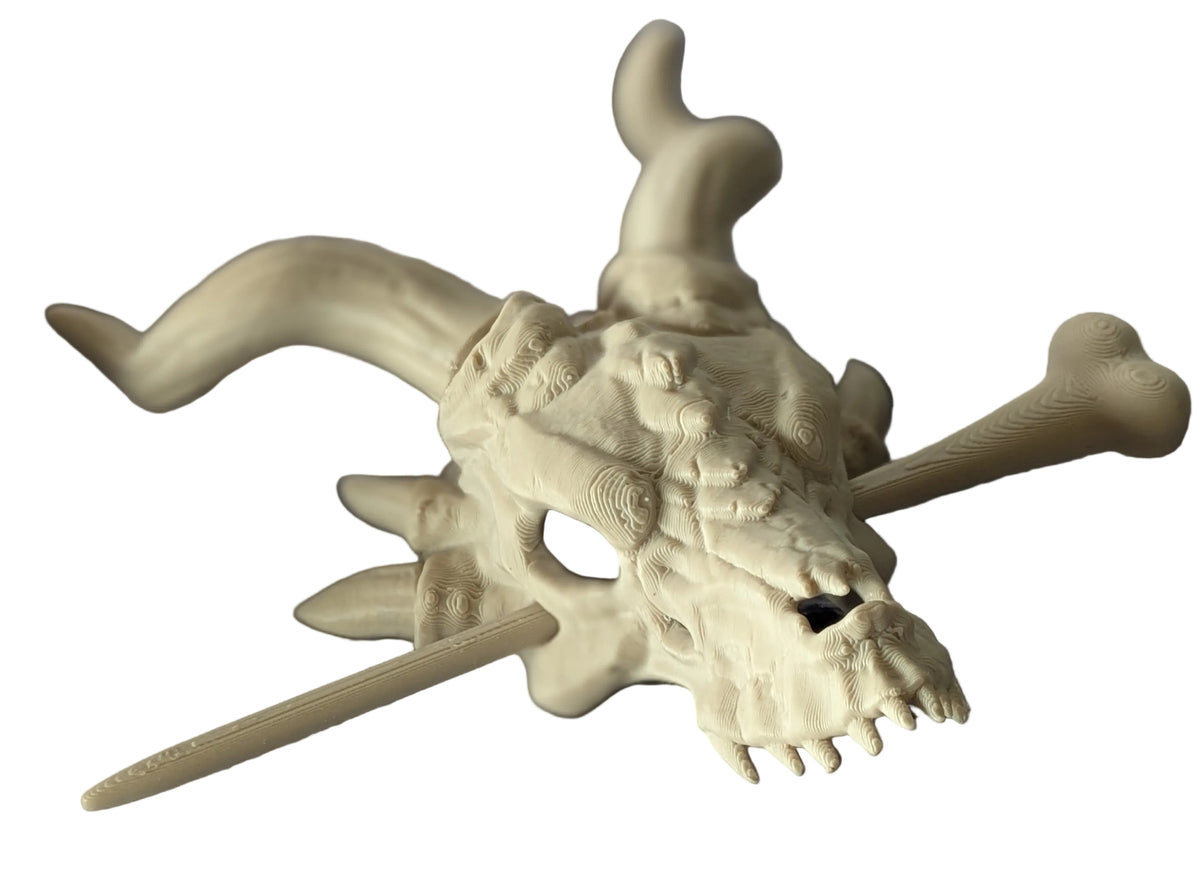 Close-up angle of bone-colored dragon skull hair stick with curling horns