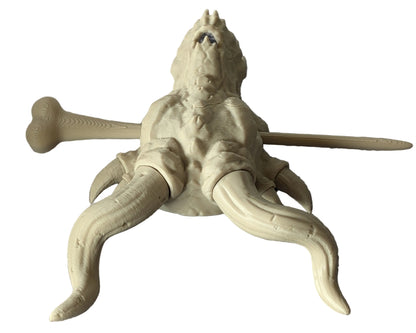 Back view of dragon skull hair stick showing the bone-shaped fork prongs