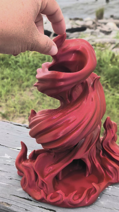 Red flame-shaped 3D printed dice tower with built-in dice tray base