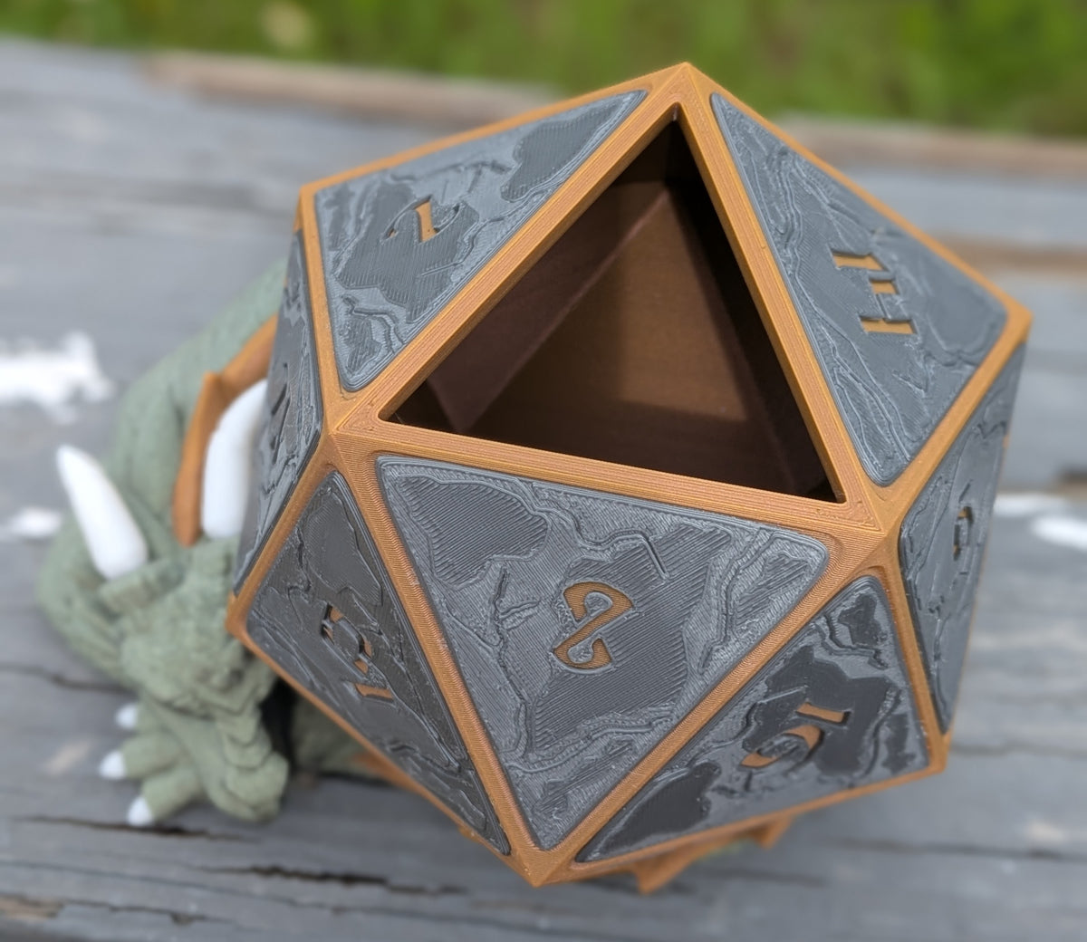 Sleeping dragon D20 planter, angled view showing dragon head detail