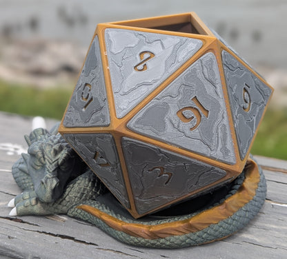 Sleeping dragon coiled around a giant D20 dice planter, front view