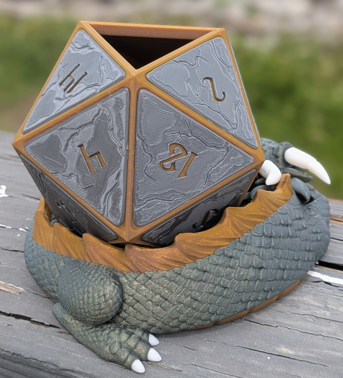 Sleeping dragon D20 planter, close-up of dragon scales and claws