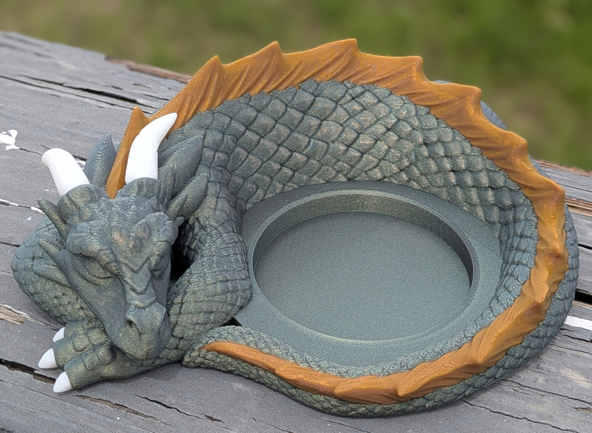 Sleeping dragon D20 planter displayed outdoors
