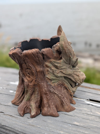 Dragon face stump planter, close-up of the snarling mouth detail