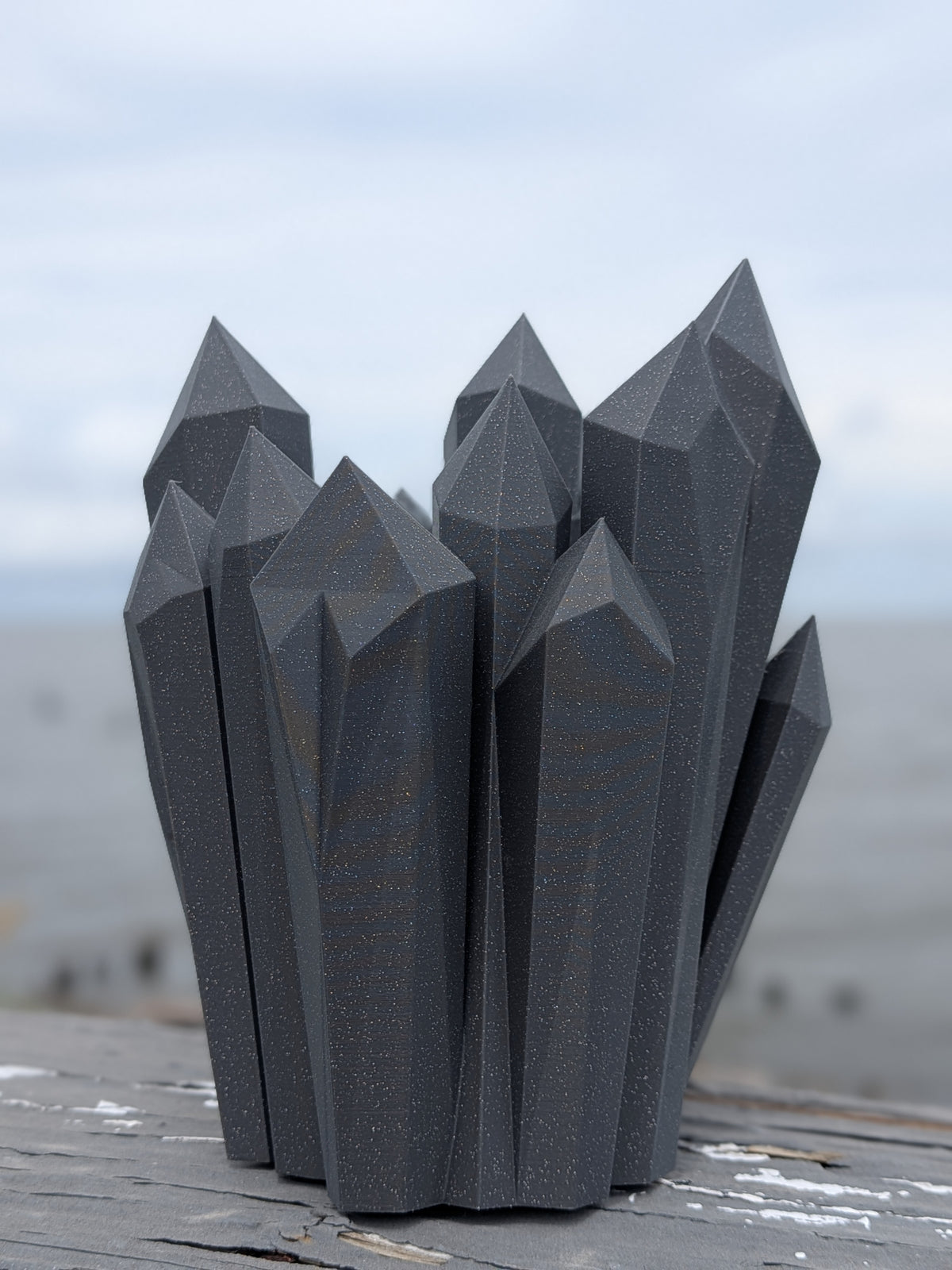 Faceted crystal cluster vase, front view with tall jagged points
